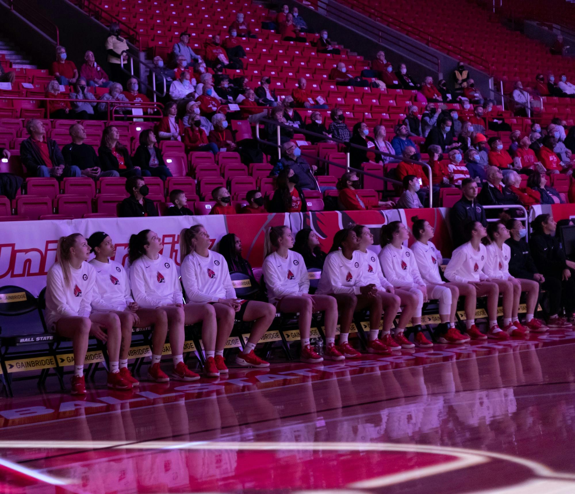 Members of the Ball State Women's Basketball team watch the big screen before the Cardinals starting linup is anounced Feb. 16 at Worthen Arena. The Cardinals fell to Buffalo 62-67 after bringing the game within two point in the final minutes of the fourth quarter. Eli Houser, DN
