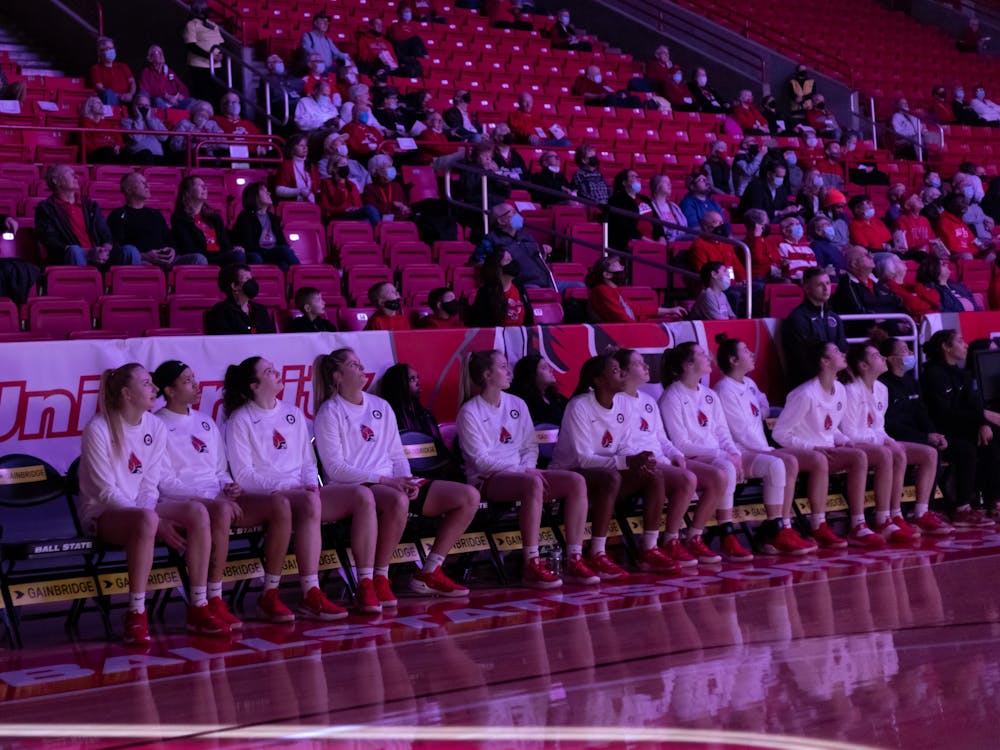 Members of the Ball State Women's Basketball team watch the big screen before the Cardinals starting linup is anounced Feb. 16 at Worthen Arena. The Cardinals fell to Buffalo 62-67 after bringing the game within two point in the final minutes of the fourth quarter. Eli Houser, DN