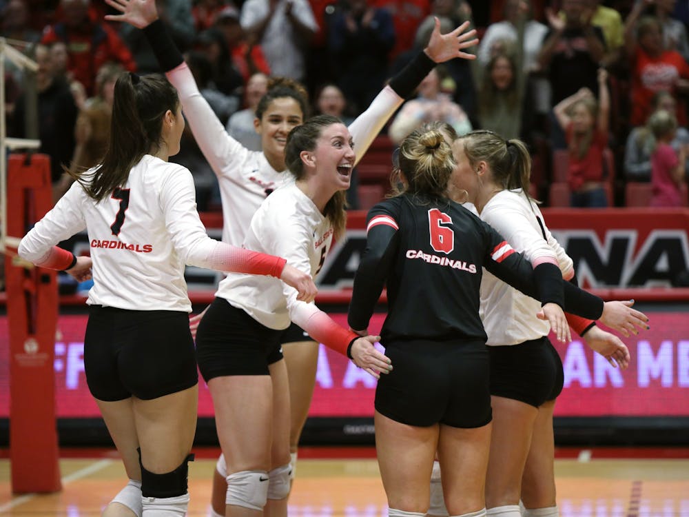 The Ball State Women's Volleyball team celebrates scoring a point in a game against Kent State Nov. 4 at Worthen Arena. Ball State swept Kent State to get their 21st win of the season. Amber Pietz, DN