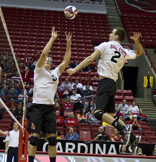Junior Graham McIlvaine, left, sets the ball up for senior Matt Leske against St. Francis on Jan. 12. The men’s volleyball team will play Mount Olive Friday. DN FILE PHOTO EMMA FLYNN
