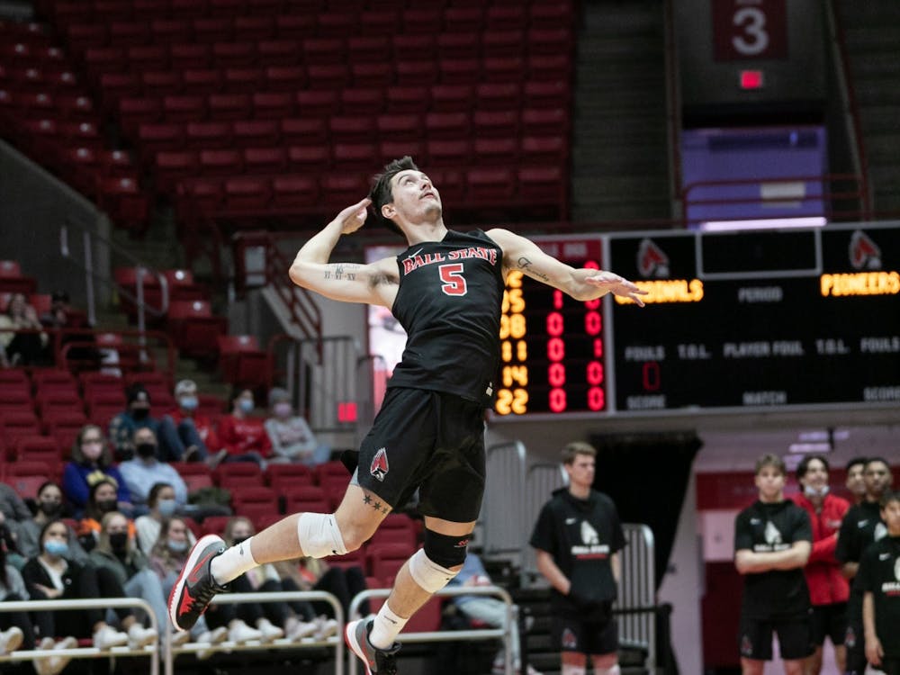 Graduate Student Quinn Iasscson (5) serves the ball towards the Tusculum University side of the net Jan. 15 at Worthern Arena. Iasscson had 5 aces against the Pioneers, winning their second game of the year. Eli Houser, DN