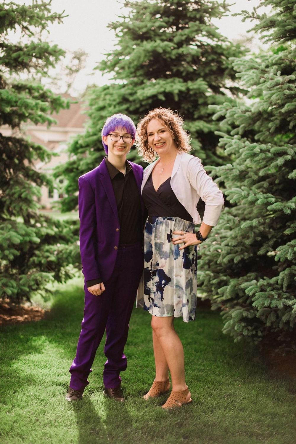 <p>Heidi and her child Alyx Buffenbarger pose for Alyx’s senior high school photo May 15 2022. Buffenbarger is an Indiana State leader for Free Mom Hugs. Photo Provided, Asacia Norris</p>