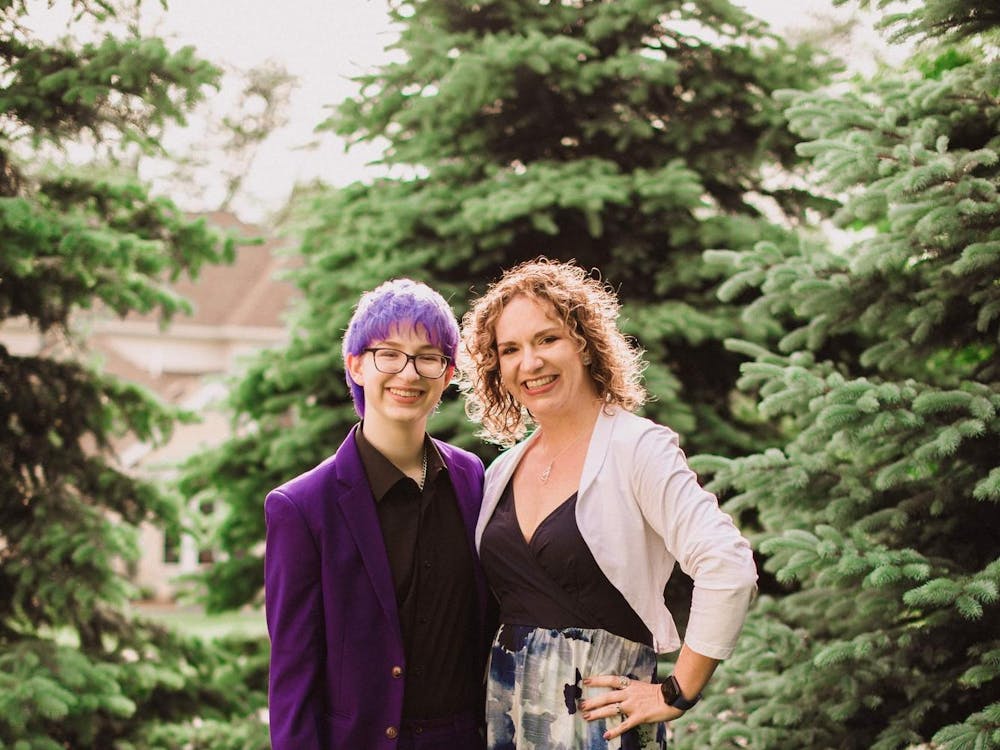 Heidi and her child Alyx Buffenbarger pose for Alyx’s senior high school photo May 15 2022. Buffenbarger is an Indiana State leader for Free Mom Hugs. Photo Provided, Asacia Norris