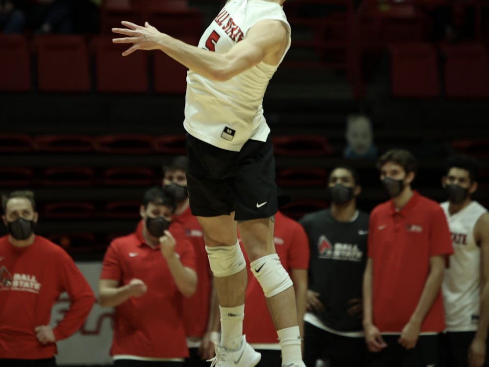 Senior setter Quinn Isaacson serves the ball Feb 27, 2021, in John E. Worthen Arena. The Cardinals lost 3-2 to the Buckeyes. Rylan Capper, DN