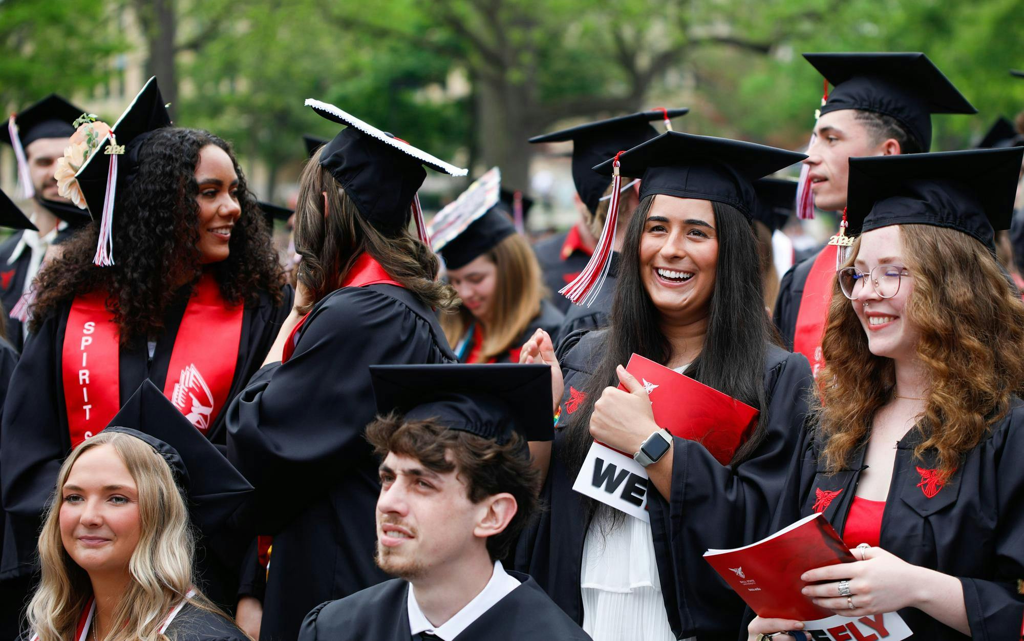 Students of the College of Information and Media stand as they are recognized during commencement May 4 at The Quad. Andrew Berger, DN