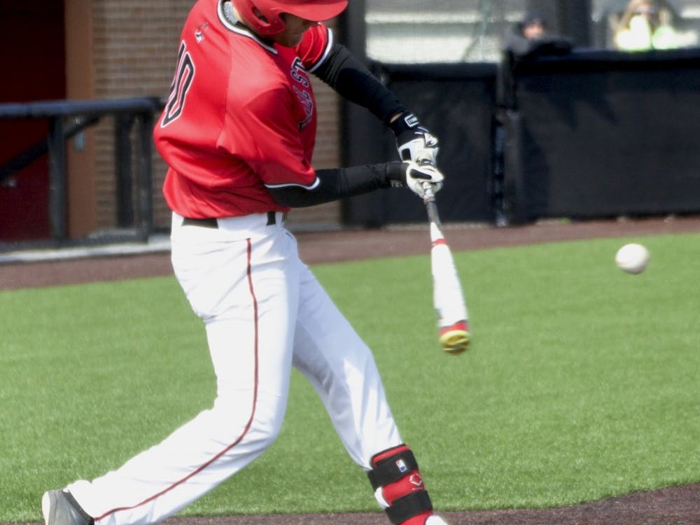 Ball State’s junior infielder Sean Kennedy hits the ball in the game against Dayton on March 19. DN PHOTO GRACE RAMEY