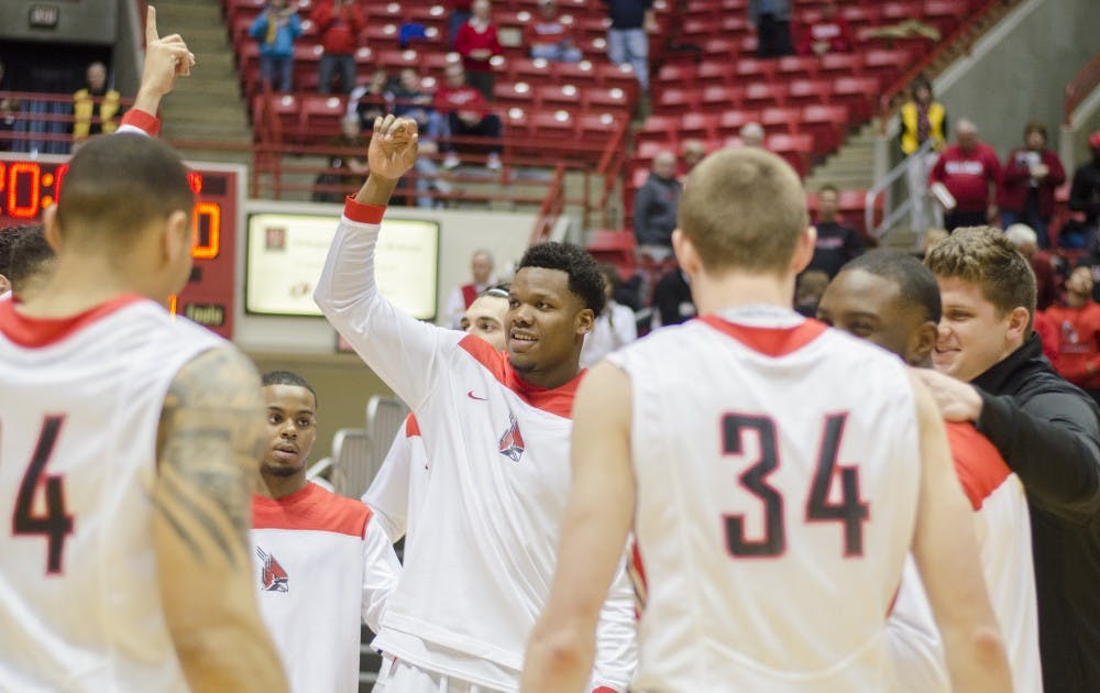 Members of the men's basketball team prepare huddle up before the game against Bowling Green on Feb. 14 at Worthen Arena. DN PHOTO BREANNA DAUGHERTY