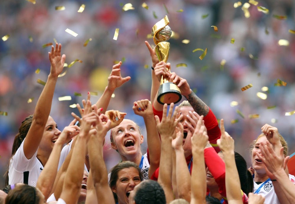 The United States celebrates winning the World Cup following the FIFA Women's World Cup Final match between USA and Japan on Sunday, July 5, 2015, at BC Place Stadium in Vancouver, Canada. (Vaughn Ridley/PA Wire/Zuma Press/TNS)