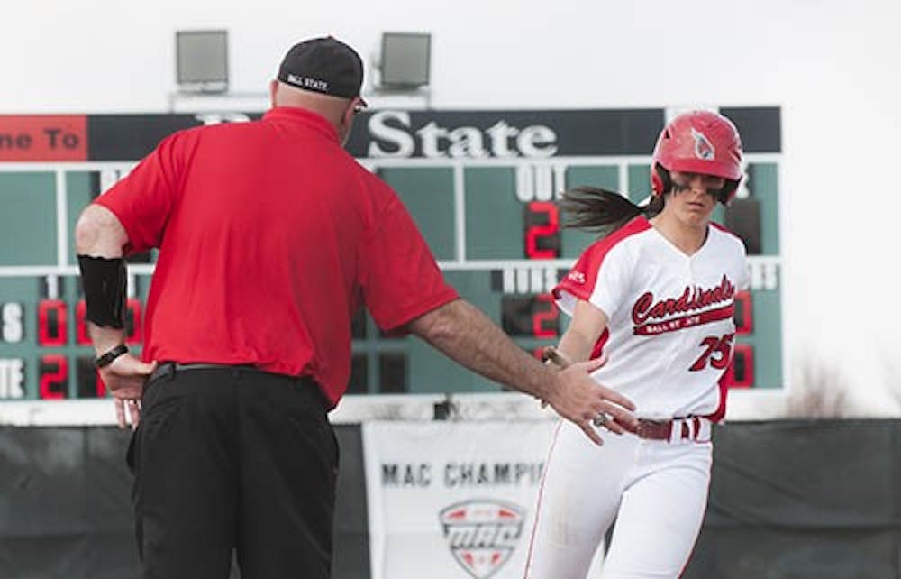 Junior Jennifer Gilbert receives a high-five as she rounds third after her home run. The left fielder, Gilbert, set the Ball State single-season home run record with 19 in 2012-13. Gilbert also became the Mid-American Conference’s all-time career RBI leader on April 12. The Cardinal offense rallied around Gilbert’s play to claim a MAC-best batting average. DN FILE PHOTO JONATHAN MIKSANEK