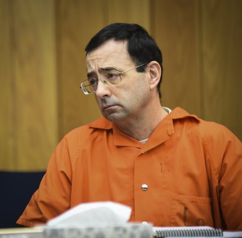 <p>Larry Nassar listens to 17-year-old Jessica Thomashow’s victim impact statement Wednesday, Jan. 31, 2018, during the first day of victim impact statements in Eaton County Circuit Court in Charlotte, Mich., where Nassar is expected to be sentenced on three counts of sexual assault some time next week. Nassar was sentenced to 40 to 175 years in prison in a similar hearing in another county last week. <strong>Associated Press, Photo Courtesy&nbsp;</strong></p>