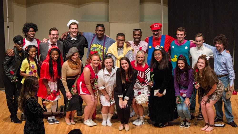 The top 10 kings and queens for the 90th Homecoming pose for a picture after the Homecoming Royalty Reveal ceremony on Sept. 27 in John J. Pruis Hall. The event featured 78 candidates who competed for best costume before being were narrowed down. Grace Ramey // DN