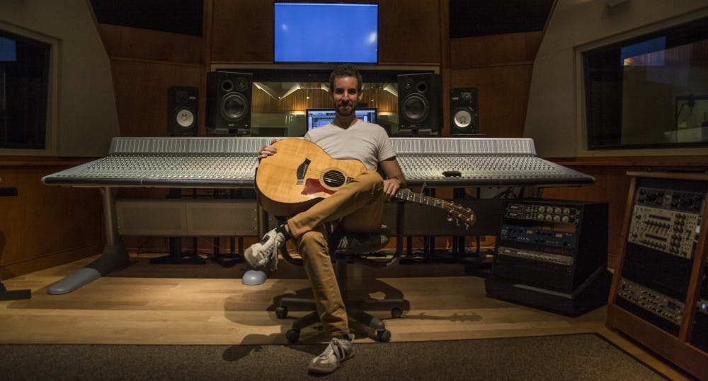 Mike Mentz records in Studio A in the Music Instruction Building on Sept. 14 at Ball State University. Mentz was introduced to the music scene on Ball State's campus when he was on the reality show, "The Song" which has yet been released to the public.&nbsp;&nbsp;Samantha Brammer // DN&nbsp;