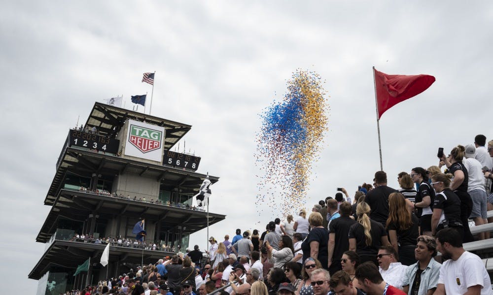 Balloons are released into the sky during the "Back Home Again in Indiana" song as a tradition of the 103rd Running of the Indianapolis 500, May 26, 2019. Stephanie Amador, DN