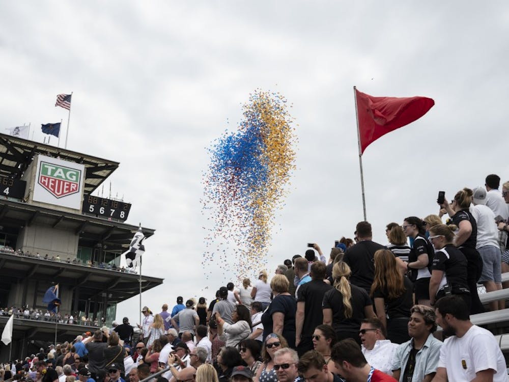 Balloons are released into the sky during the "Back Home Again in Indiana" song as a tradition of the 103rd Running of the Indianapolis 500, May 26, 2019. Stephanie Amador, DN