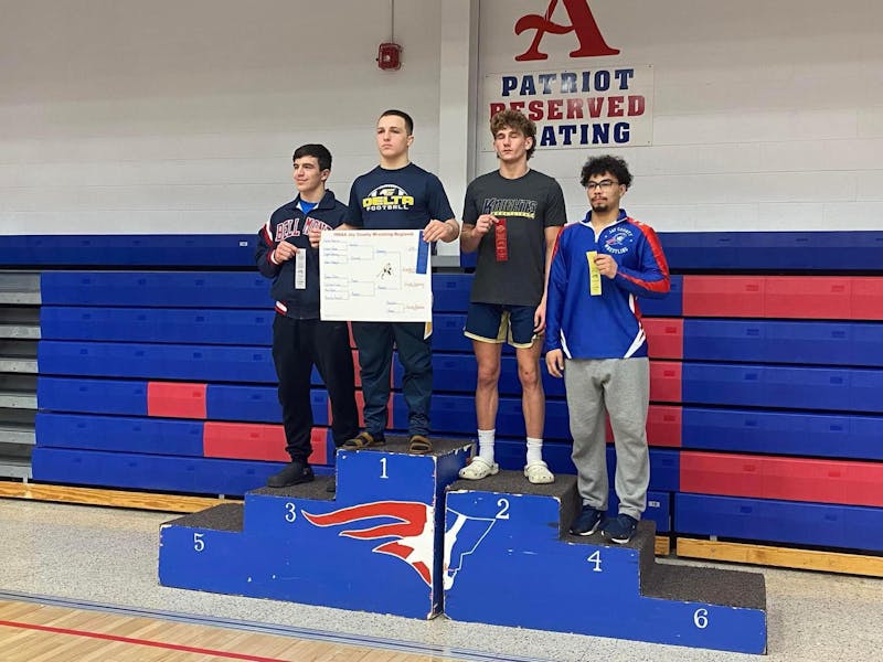Delta senior wrestler Braxton Russel poses Feb. 3 after coming in first place of the 175 pound weight class at the regional championship at Jay County High School. Tilmon Clark, photo provided.