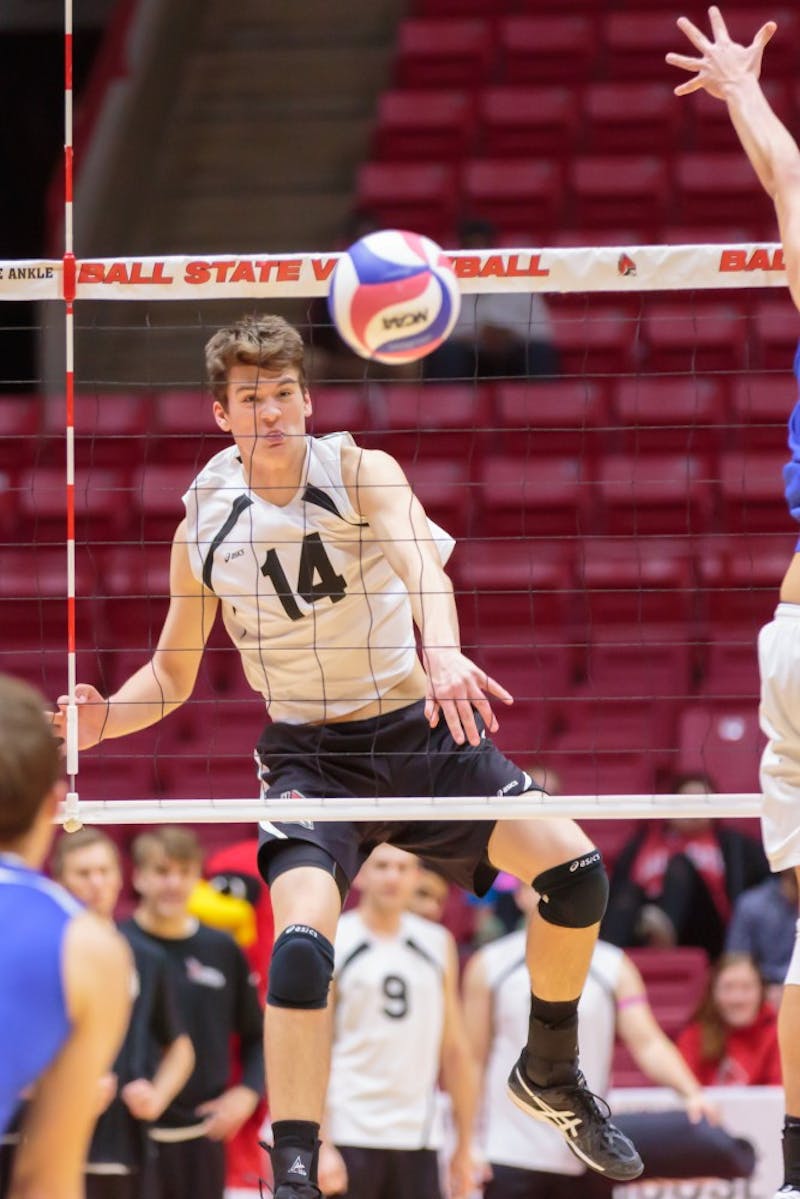Freshman outside attacker Matt Szews hits the ball over the net during the game against Fort Wayne on Feb. 7 in Worthen Arena. The Cardinals won 3-0 against the Mastodons. Kyle Crawford // DN