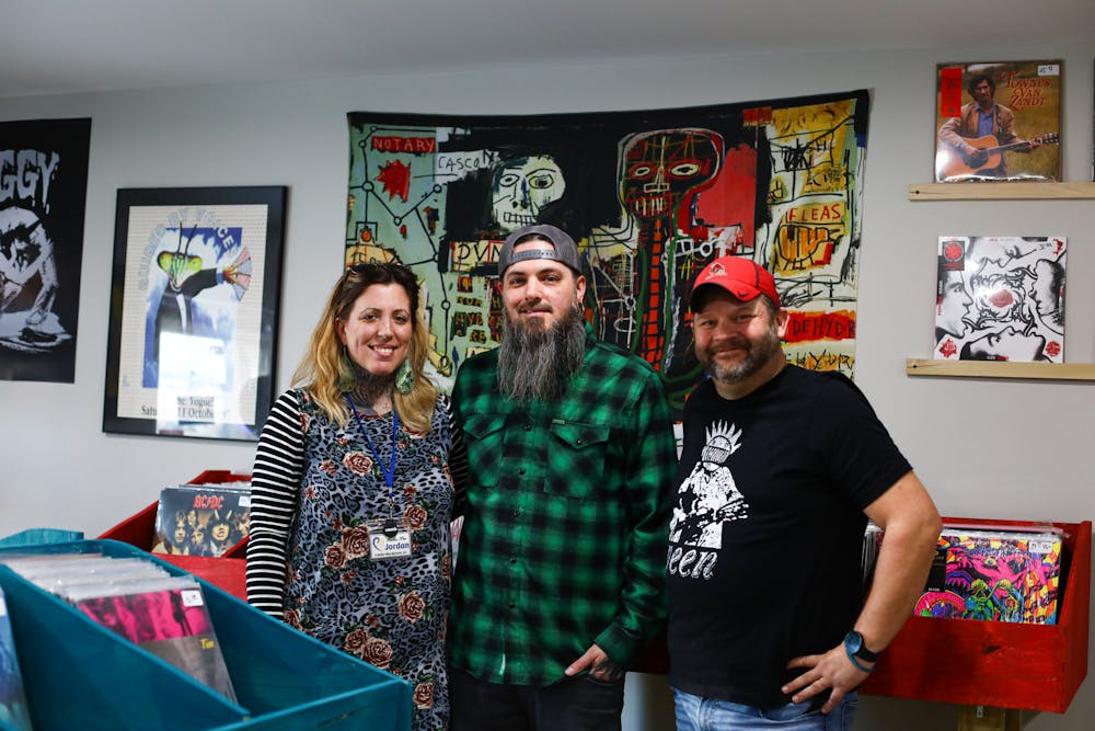 Co-owners Jordie Butler, Grant Butler and Andy Thorpe (left to right) pose for a portrait March 19 at Electric Crayon in Muncie, Ind. Jacy Bradley, DN