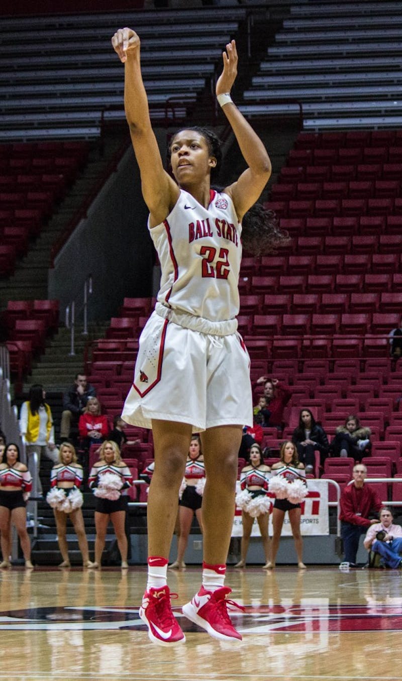 Ball State guard Destiny Washington attempts to shoot a three-pointer during the game against Eastern Michigan on Jan. 18 in Worthen Arena. The Cardinals won 78-49. Grace Ramey // DN