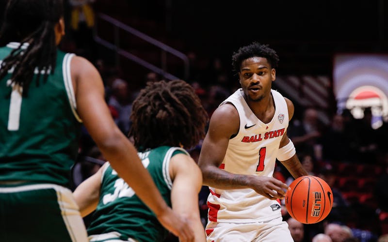 Ball State junior guard Jermarhi Hill looks down the Eastern Michigan defense Feb. 11 at Worthen Arena. Hill had seven total assists in the game. Andrew Berger, DN 