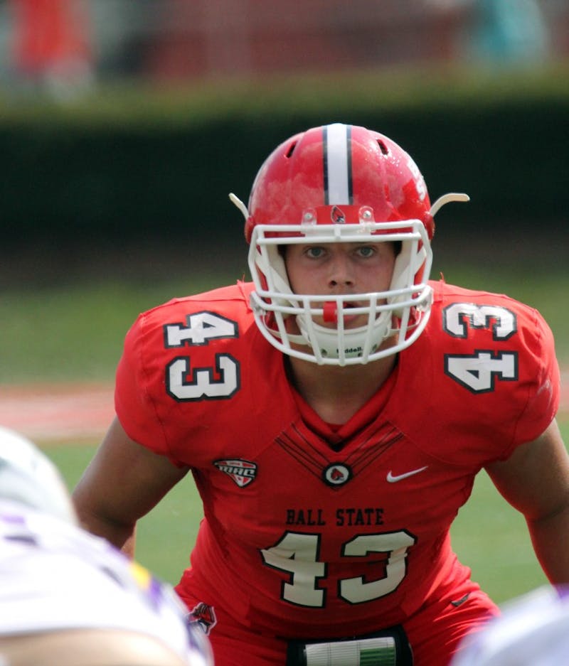 Ball State freshman linebacker David Rueth lines up at the line of scrimmage during the Cardinals’ game against Tennessee Tech on Sept. 16 at Scheumann Stadium. Rueth had one solo tackle and 4 assists. Paige Grider, DN File