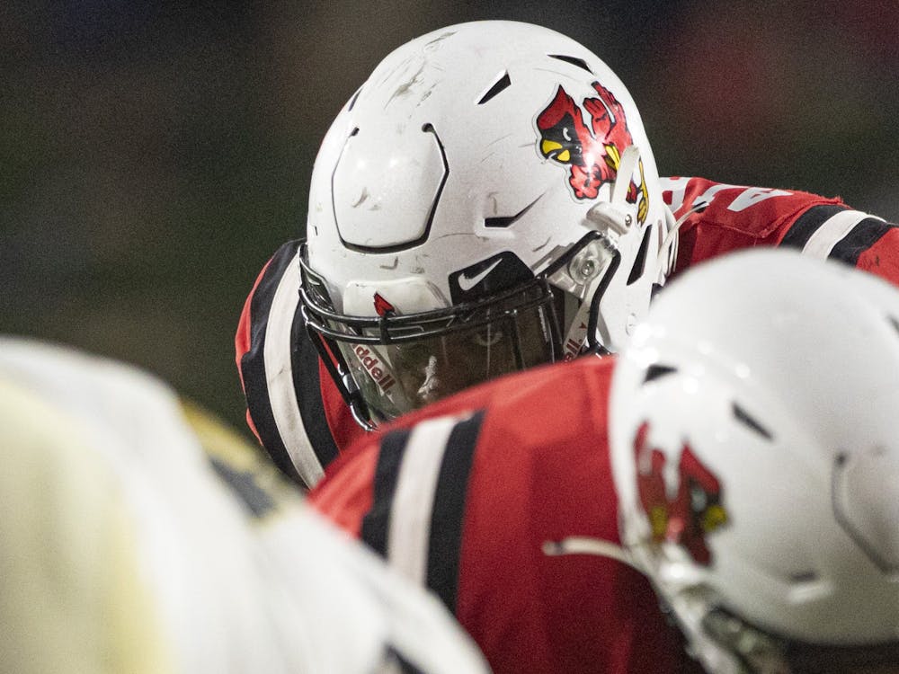 Cardinals fifth year outside linebacker Christian Albright looks over the defensive line Oct. 2, 2021, at Scheumann Stadium. The Cardinals beat the Black Knights 28-16. Jacob Musselman, DN