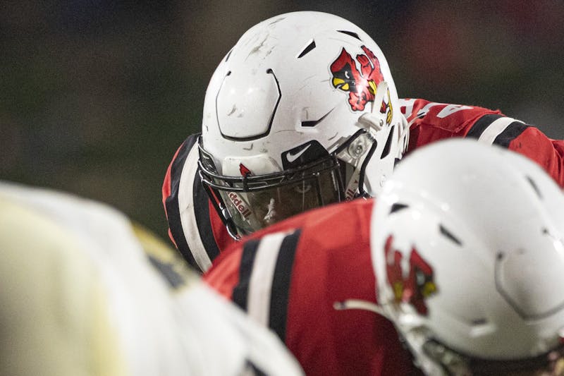 Cardinals fifth year outside linebacker Christian Albright looks over the defensive line Oct. 2, 2021, at Scheumann Stadium. The Cardinals beat the Black Knights 28-16. Jacob Musselman, DN