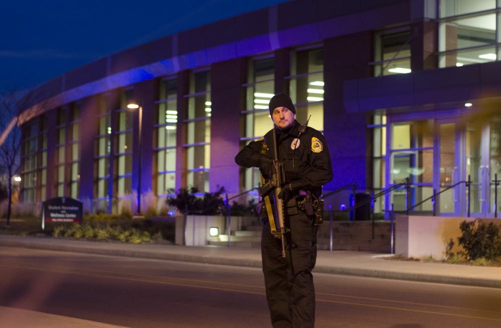 Police secure the Student Recreation and Wellness Center after a report of an armed assailant in the building. DN PHOTO COREY OHLENKAMP