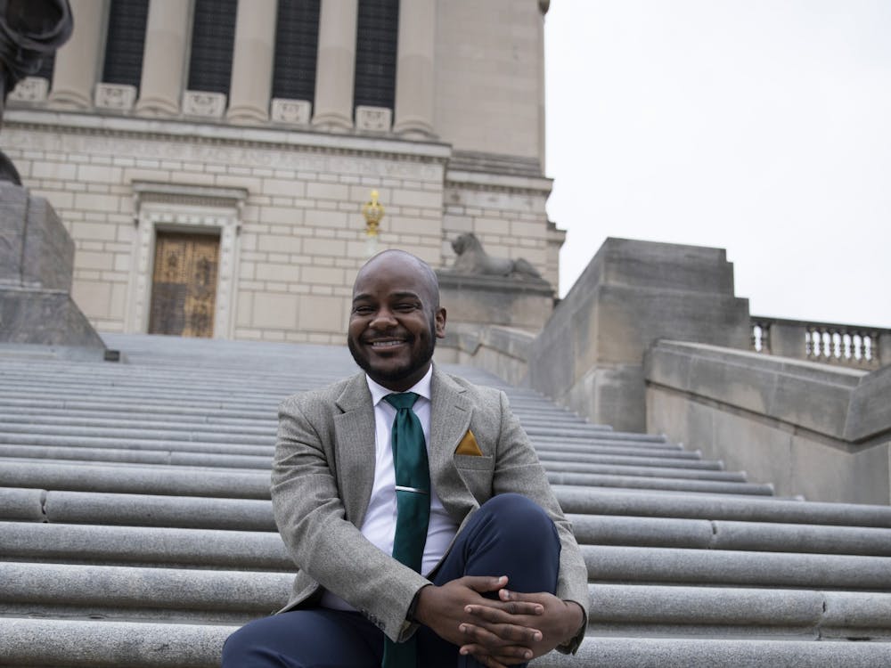 Aaron Paige, assistant professor of music, poses for a photo March 28, 2021, at the Indiana War Memorial in Indianapolis. As a musician, Paige said he wants to always elevate and push the boundaries of his art. As a professor, Paige said he wants his students to have that same “hunger” for change as he does. Jacob Musselman, DN