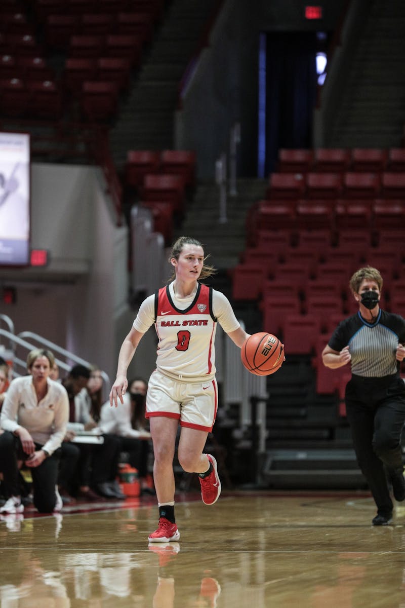 Freshman Ally Becki (0) brings the ball down the court Jan. 22 at Worthern Arena. Becki's 9 points helped the Cardinals beat Central Michigan University. Eli Houser, DN