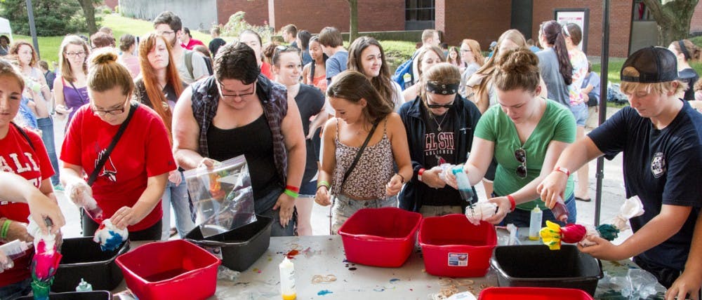 Students make tie-dye T-shirts at the University Program Board-sponsored Quad Bash in 2014. The Quad Bash is scheduled for Aug. 27, 2021 and will include music, food and games. Taylor Irby, DN File