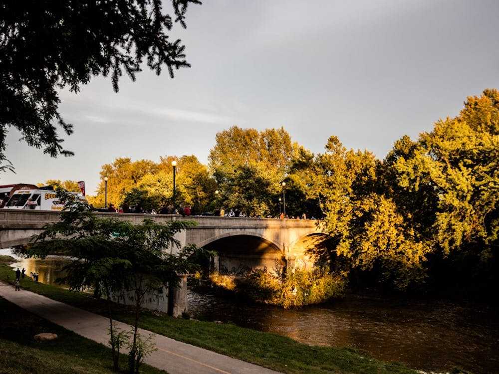 Muncie's Bridge Dinner welcomes over 900 guests to enjoy the evening at the Washington Street Bridge Sept. 27, 2018. The dinner's goal is to engage the community with one another, the town and local vendors. Madeline Grosh,DN