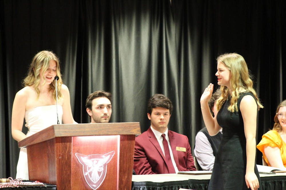 During the Student Government Association’s (SGA) inauguration ceremony on April 17, Vice President Monet Lindstrand swears in Brenna Large as the new vice president for the 2024-2025 school year at the L.A. Pittenger Student Center. Meghan Braddy, DN