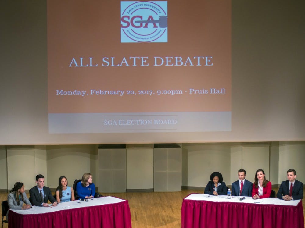 OPTiC and IGNITE speak at the All the Slate Debate on Feb. 20 in John J. Pruis Hall. These slates are running for the 2017-18 SGA executive board. Teri Lightning Jr., DN