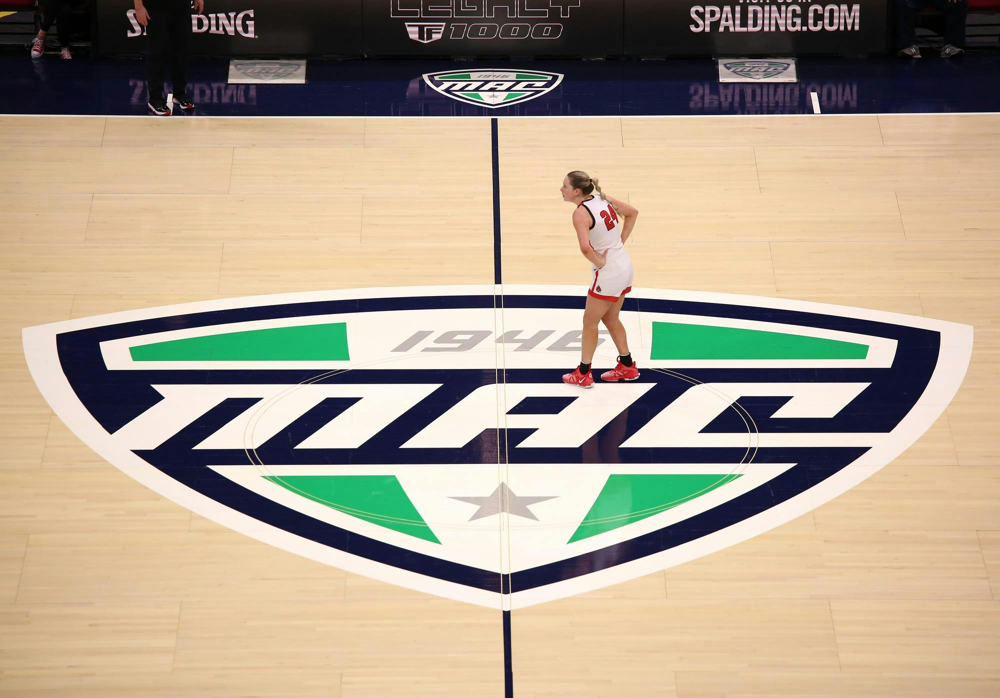 Junior Madelyn Bischoff stands at mid-court March 13 during a game against Ohio at Rocket Mortgage Fieldhouse in Cleveland, Ohio. Bischoff ended the game with 15 points. Zach Carter, DN.
