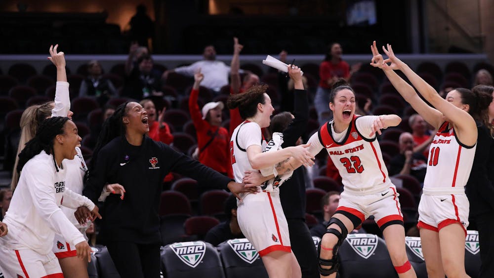Ball State women's basketball celebrates junior Alex Richard scoring a three-point basket against Ohio March 13 at Rocket Mortgage FieldHouse in Cleveland, Ohio. This was Richard's first three-point basket for Ball State. Mya Cataline, DN