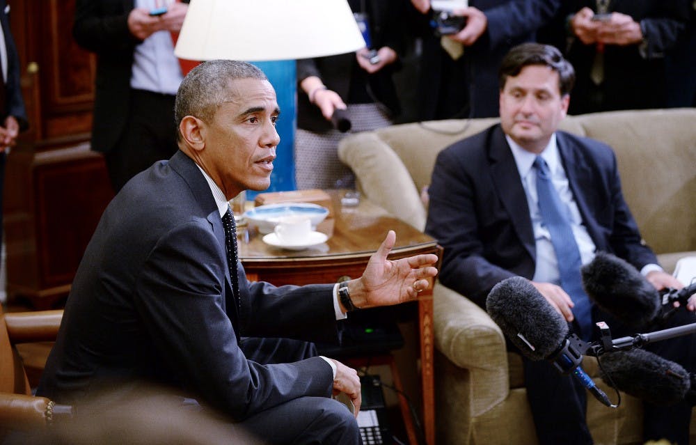 President Barack Obama holds a meeting on Ebola with Ebola Response Coordinator Ron Klain in the Oval Office of the White House on Wednesday, Oct. 22, 2014, in Washington, D.C. (Olivier Douliery/Abaca Press/MCT)
