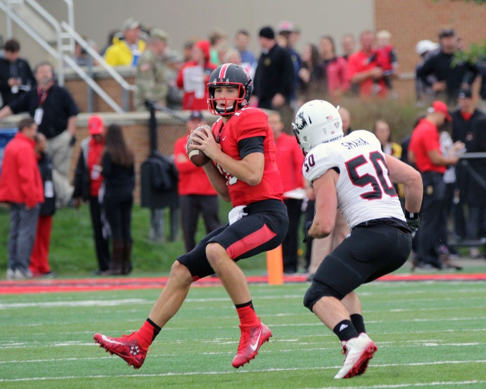 Quarterback Riley Neal looks to pass the ball during the Cardinals’ game against Northern Illinois on Oct. 1 in Scheumann Stadium. Ball State lost 31 to 24. Paige Grider// DN