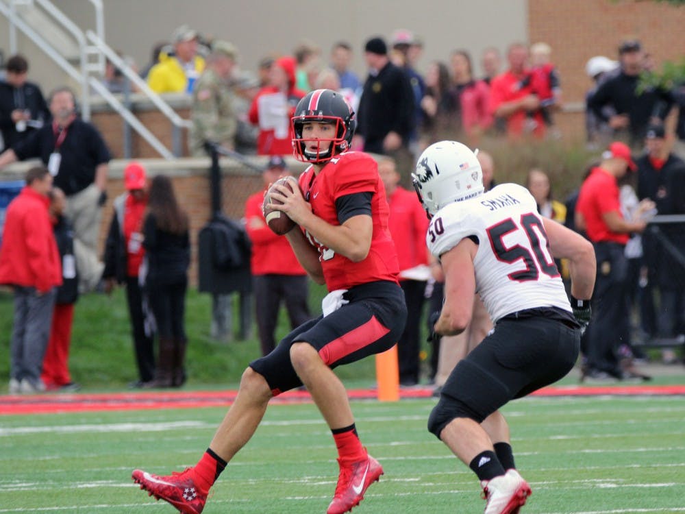 Quarterback Riley Neal looks to pass the ball during the Cardinals’ game against Northern Illinois on Oct. 1 in Scheumann Stadium. Ball State lost 31 to 24. Paige Grider// DN