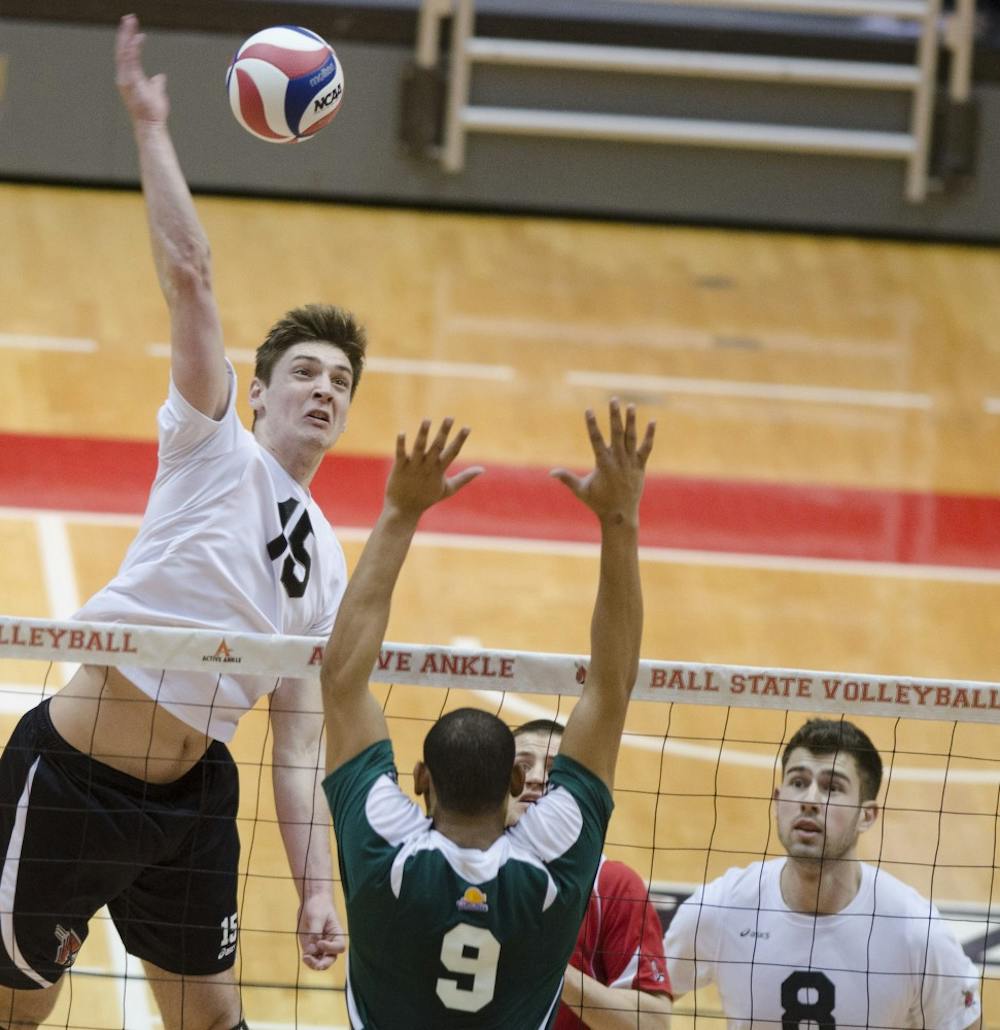 Sophomore outside attacker Marcin Niemczweski hits the ball over the net during the match against Mount Olive on March 1 at Worthen Arena. DN PHOTO BREANNA DAUGHERTY 