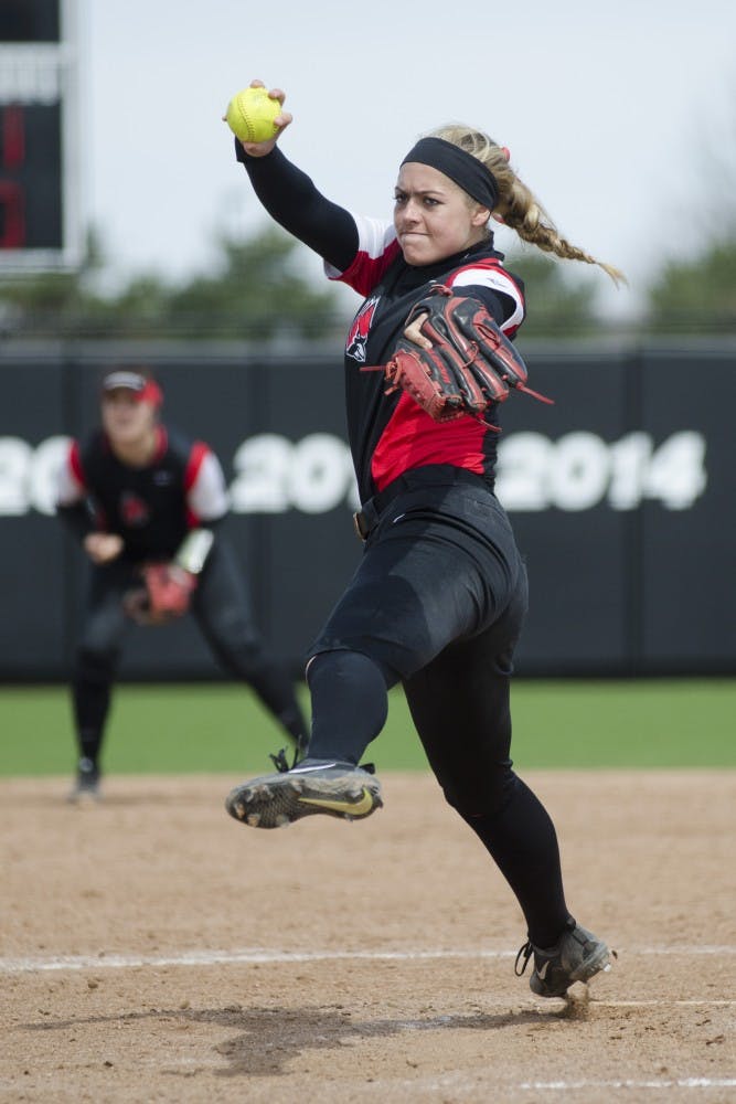 Junior pitcher Carolyn Wilmes pitches the ball during the game against Miami University on April 2 at the First Merchants Ballpark Complex. Ball State won 6-3 to complete the three-game sweep against the RedHawks. Emma Rogers // DN