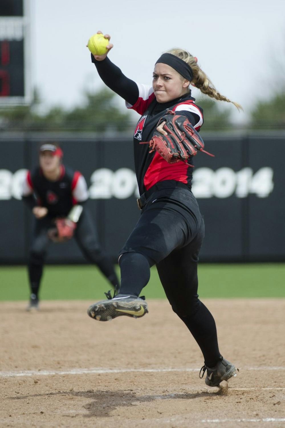 Junior pitcher Carolyn Wilmes pitches the ball during the game against Miami University on April 2 at the First Merchants Ballpark Complex. Ball State won 6-3 to complete the three-game sweep against the RedHawks. Emma Rogers // DN