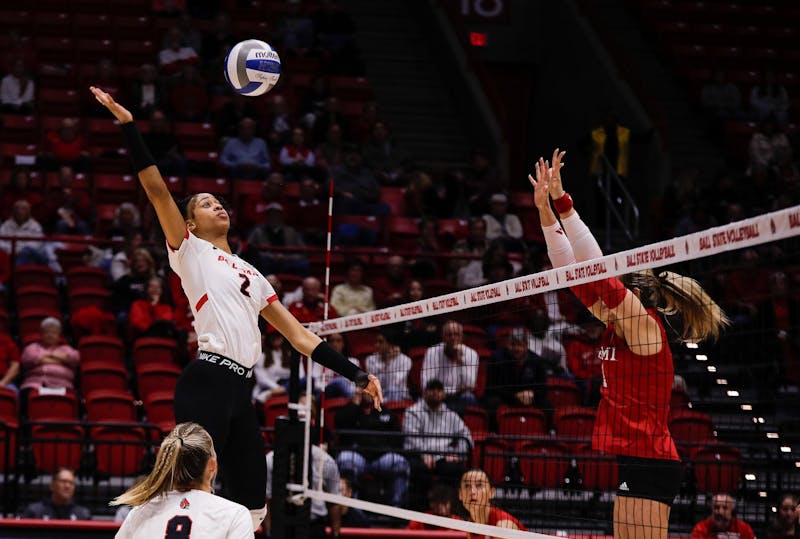 Graduate student middle hitter Aayinde Smith spikes the ball against Miami Nov. 12 at Worthen Arena. Smith had eight blocks against the Redhawks. Andrew Berger, DN 