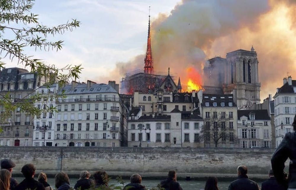 The view of the fire that engulfed Notre Dame Cathedral in Paris. The fire burned for 12 hours and destroyed the spire and rose windows on the cathedral. (TNS)