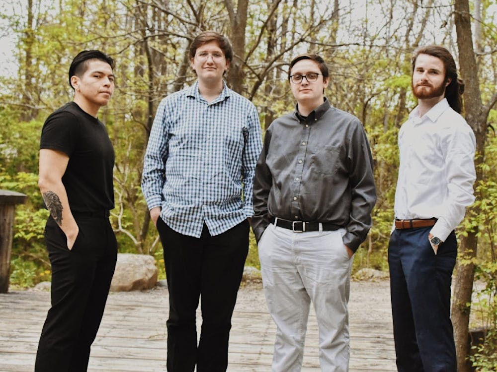 Jacob Smith (right center) stands with the other members of his jazz group "The Jacob Smith Quartet" — Diego Balseca, Sam Green and Alec Kosla — ahead of their District Theatre performance in Indianapolis June 4, 2021. The opportunity to perform came from Ball State Professor of Music Performance Mark Buselli. Jacob Smith, Photo Provided