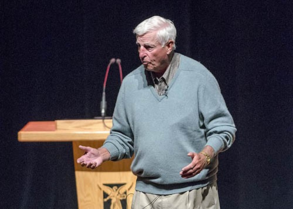 NCAA basketball coach Bob Knight talks with students and community members at "An evening with coach Bob Knight" at John R. Emens auditorium on Oct. 3. In addition to sharing advice and telling stories during his adress, Knight briefly spoke to the Men's basketball team during his time on campus. DN PHOTO COREY OHLENAKMP