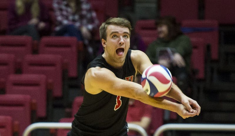 Sophomore outside hitter Blake Reardon, receives a serve from a Harvard player during the beginning of the third set, Jan. 20 at John E. Worthen Area. Grace Hollars, DN File