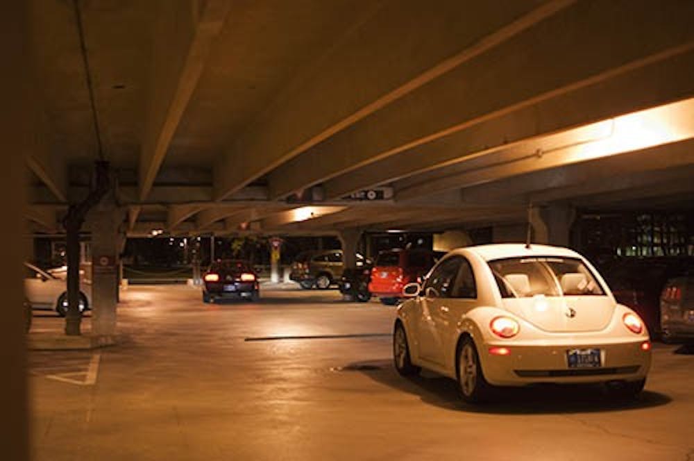 <p>A car drives through the Emens parking garage. Students are allowed to park in the garage after 7 p.m. on weekdays. DN PHOTO JONATHAN MIKSANEK</p>
<p><br></p>
