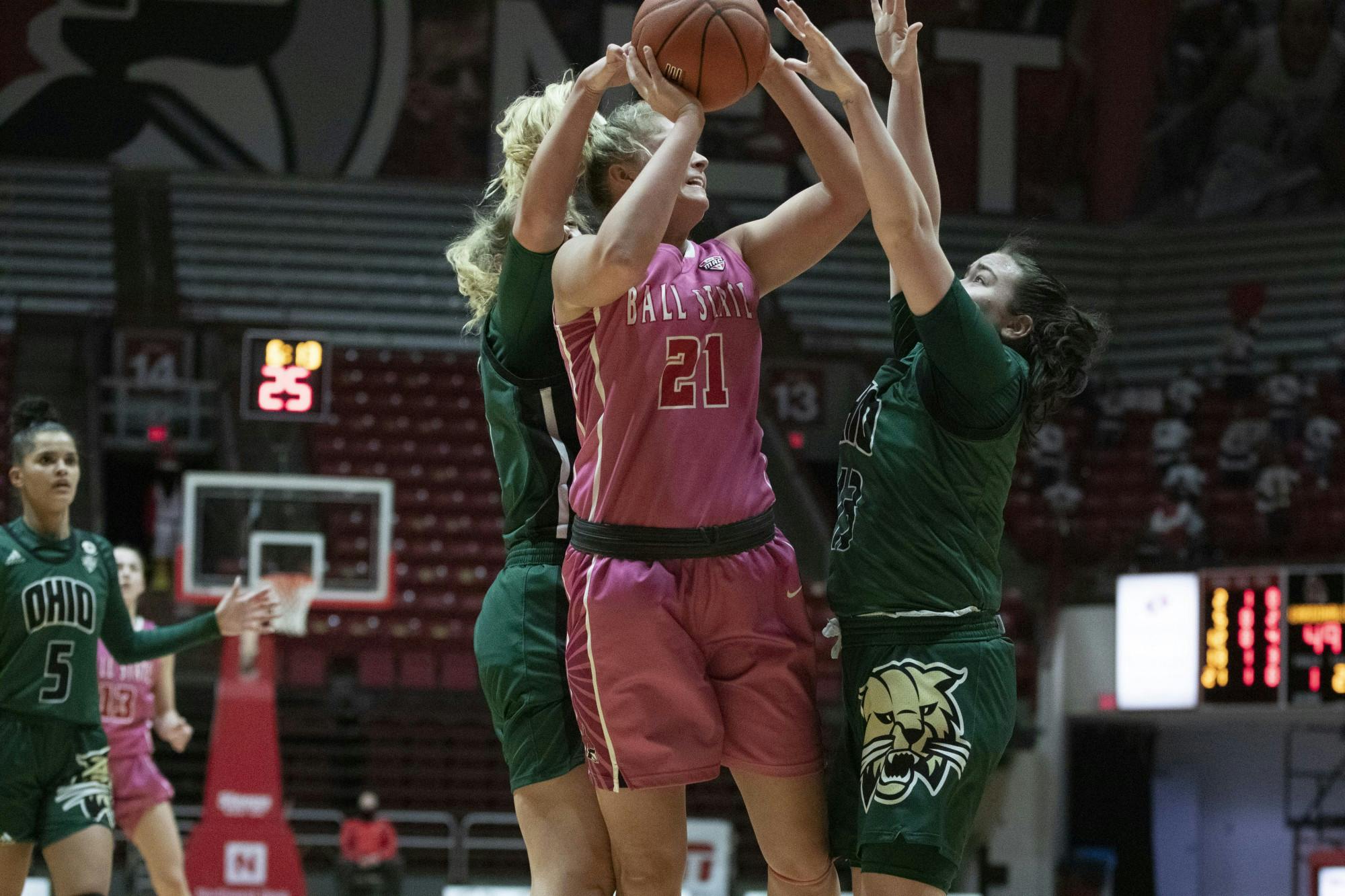 Cardinals junior forward Blake Smith shoots a shot while being defended Feb. 10, 2021, at John E. Worthen Arena. The Cardinals lost 88-66. Grace Walton, DN