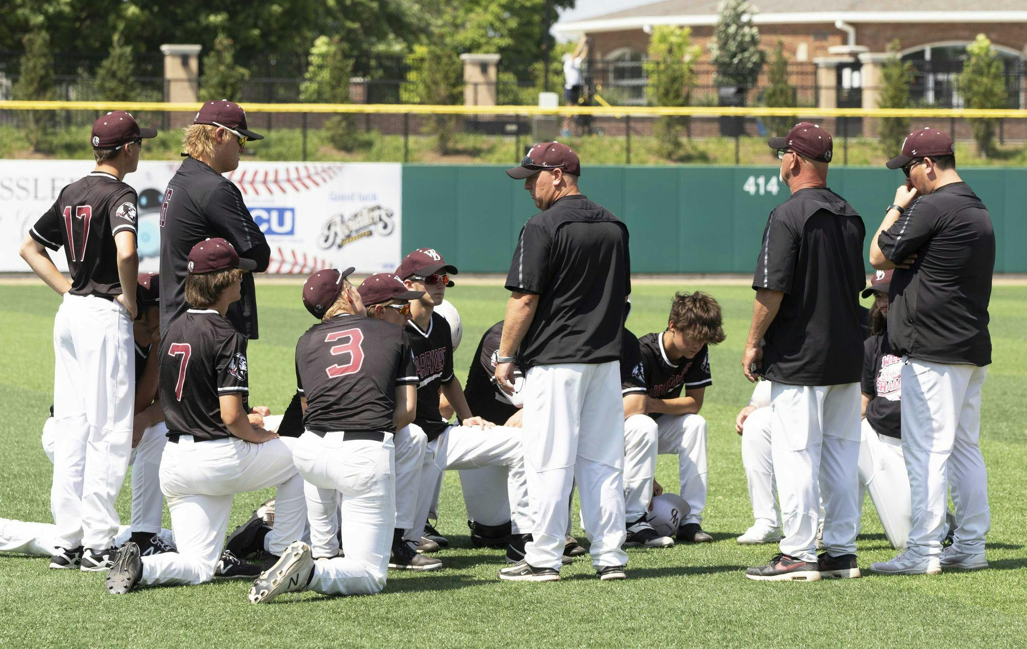 Wes-Del head coach Daniel Hanson talks to the team June 10 following the Warriors semi-state loss at Loeb Field. Zach Carter, DN.