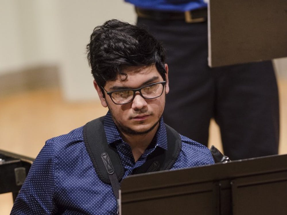 Tenor saxophonist Hunter Madison performs on May 1 with the Brazilian Ensemble at John J. Pruis Hall. The coordinator of the Ensemble was Bruno Carera, who arranged the music. Stephanie Amador // DN 